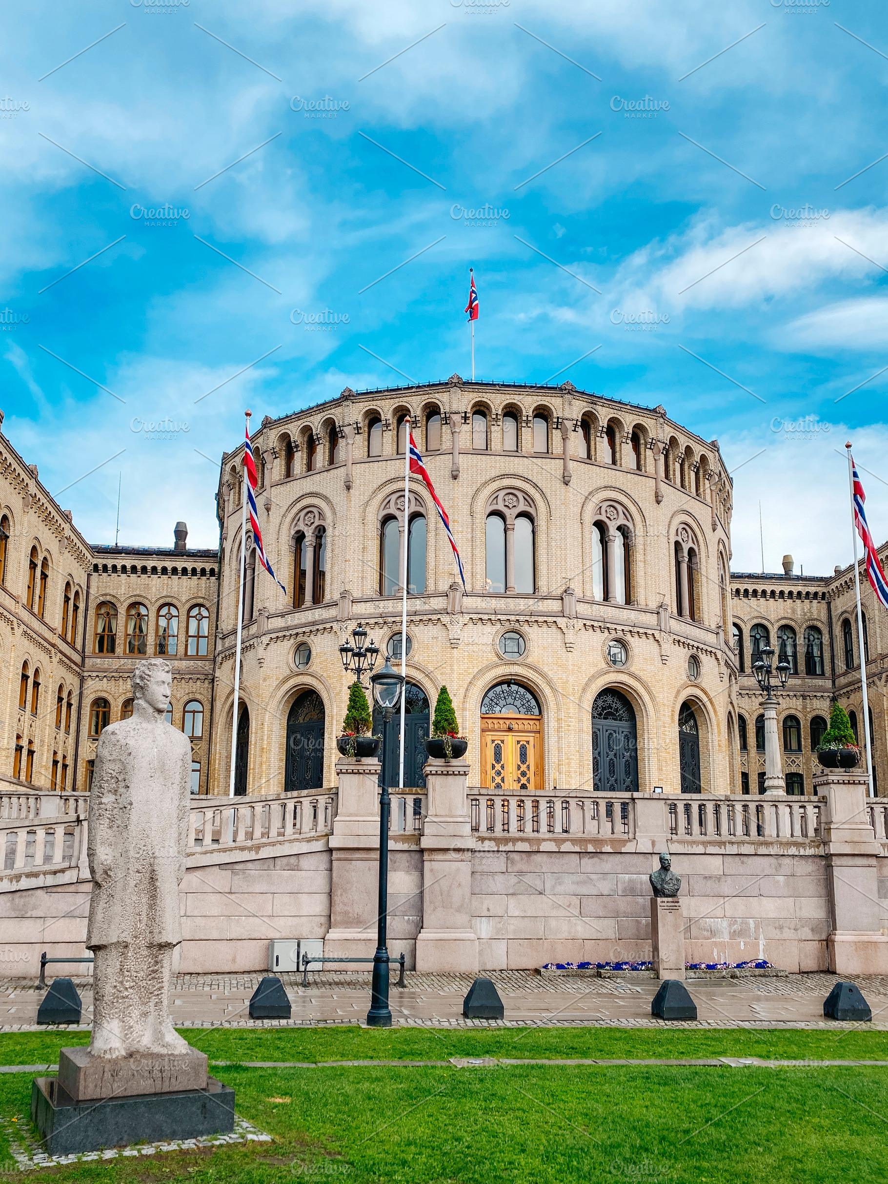 Norwegian Parliament beyond a garden lawn in Oslo, a Photo by Nito