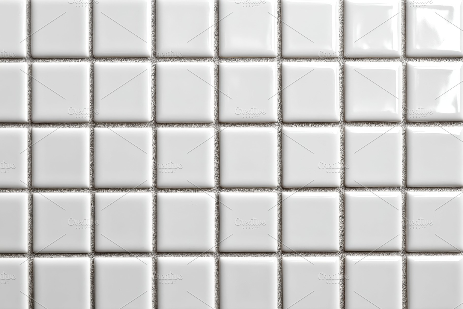 Glossy white square tiles on wall, a Background Photo by AlyaAnd