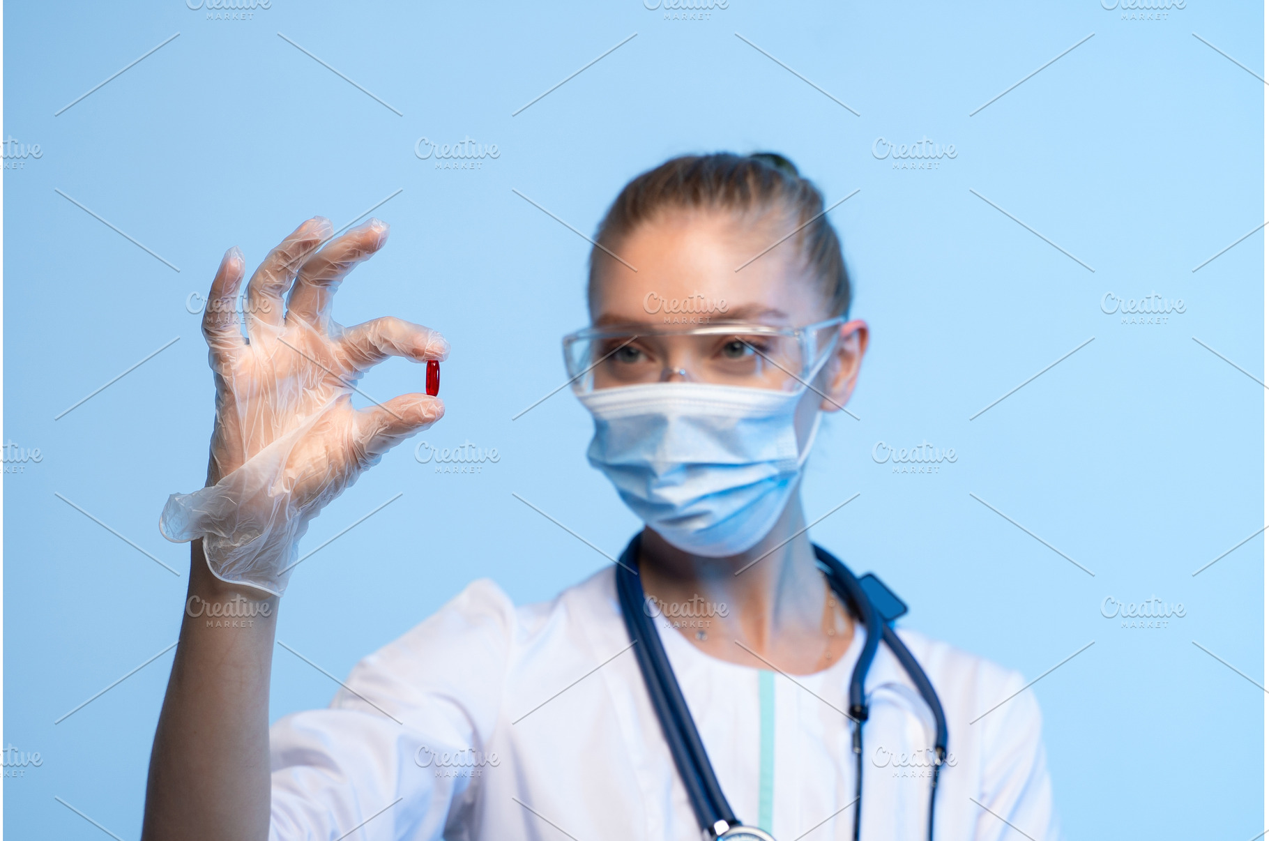 Doctor or scientist holding a red, a Health & Medical Photo by volodymyrshtun13795
