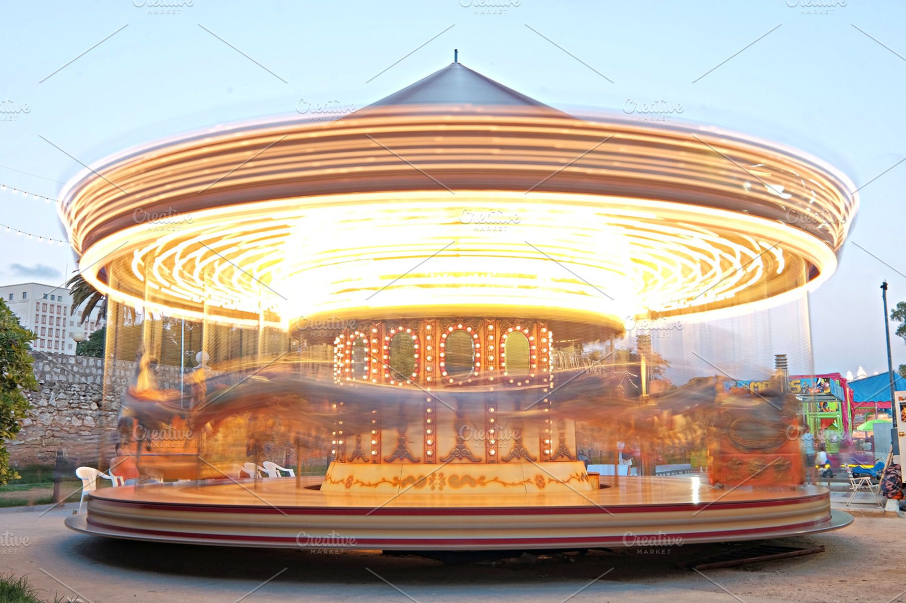 Lit carousel in motion stock photo containing lit and carousel, an Arts & Entertainment Photo by Kynamuia