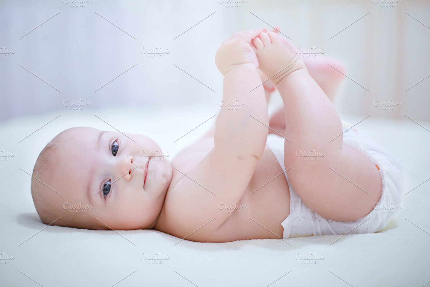 Cute baby infant boy wearing diaper featuring baby, bath, and bed, a Person Photo by Rodica Ciorba