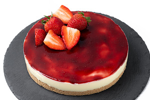 Slice of cheesecake with strawberries, a Food & Drink Photo by etorres69