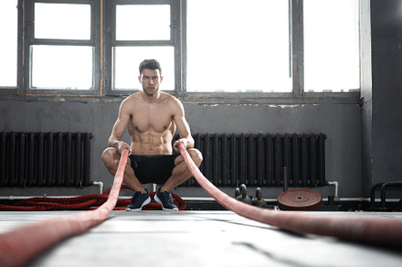 man with battle rope doing exercise, a Sports & Recreation Photo by OPOLJA