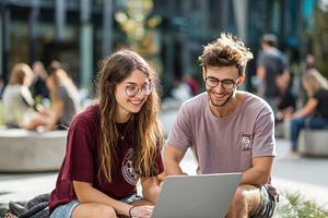 Students collaborating on laptop out, a Photo by Pixeness Studio