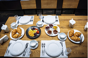 Top view of a breakfast table, a Food & Drink Photo by Red Hot Chili Pepper Shop