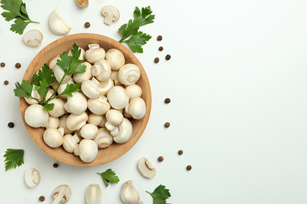 Concept of tasty food with champignon on white, a Food & Drink Photo by AtlasStudio PRO