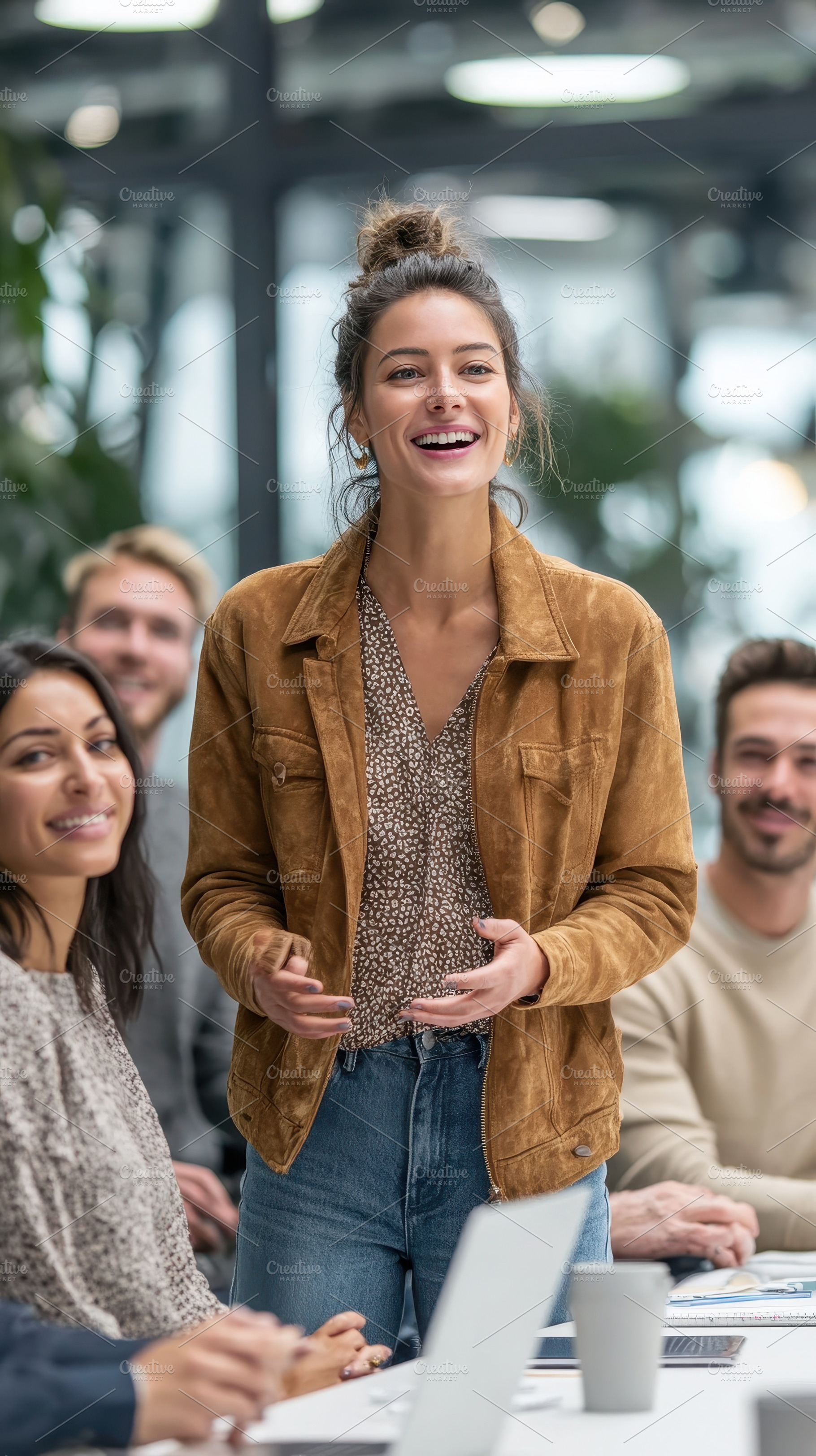 Happy woman presenting at a business, a Photo by Pixeness Studio