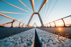 Modern pedestrian bridge at sunrise, an Architecture Photo by AlyaAnd