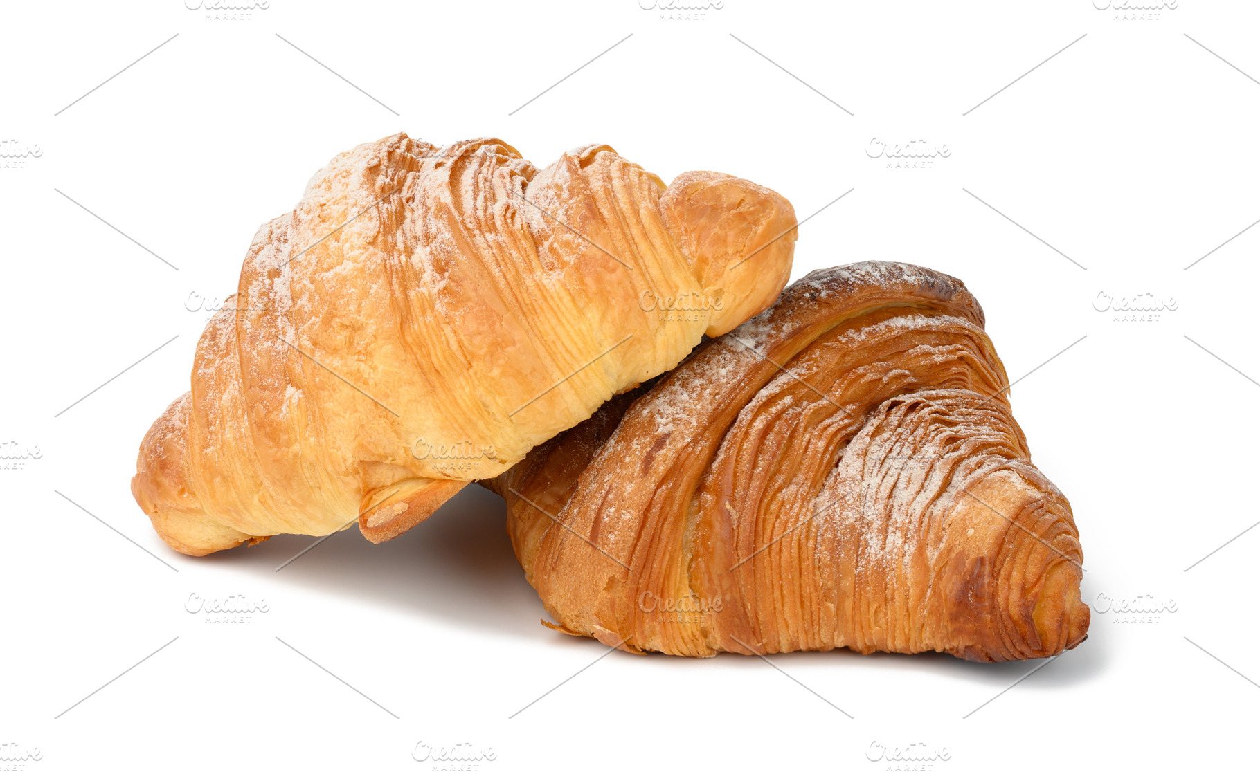 two baked croissants on a white isolated background, dessert for, a Food & Drink Photo by ndanko