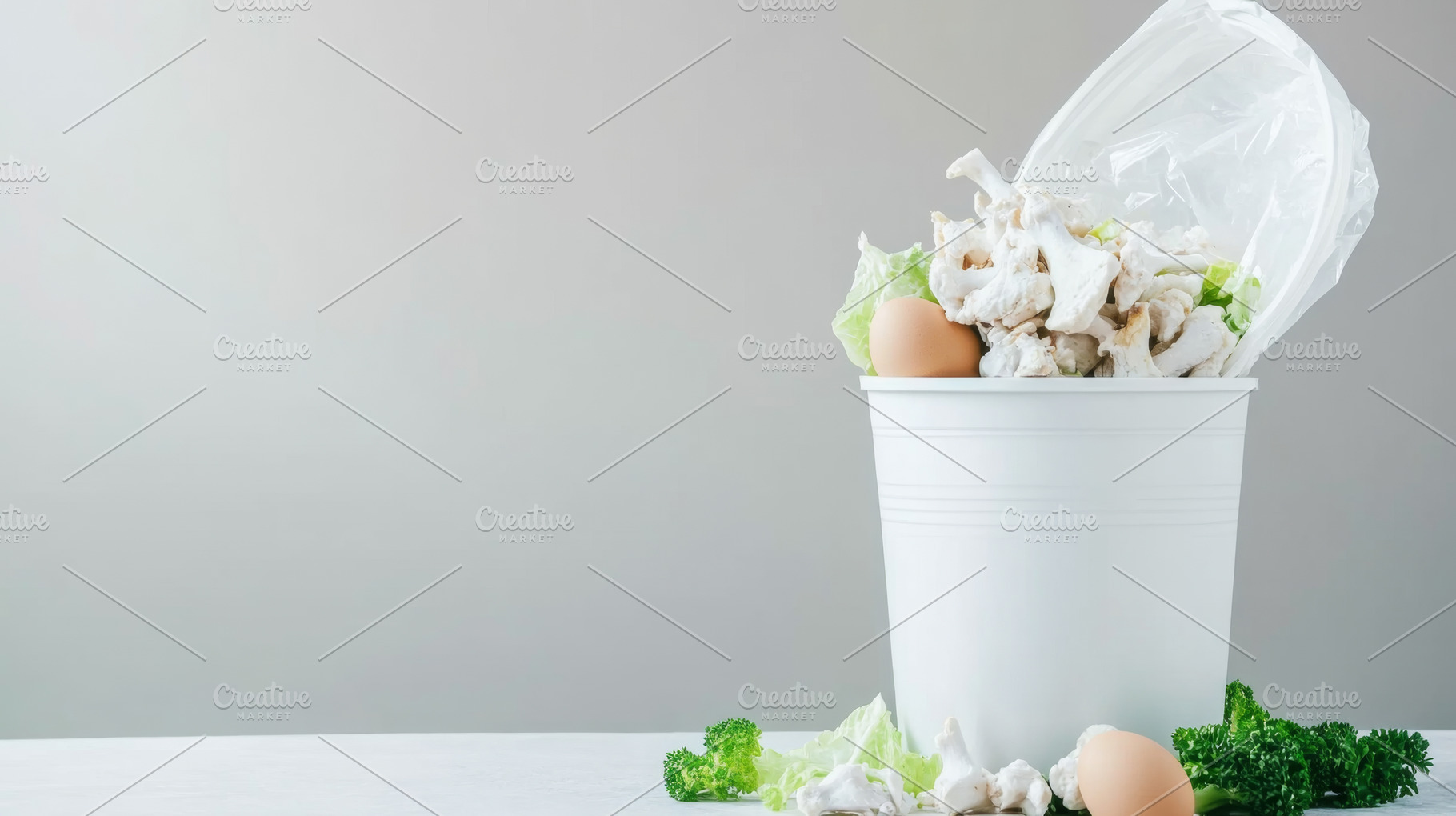 Food waste bin filled with chicken b, a Photo by Dvoevnore photos