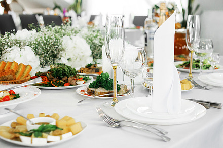 Serving the banquet table.