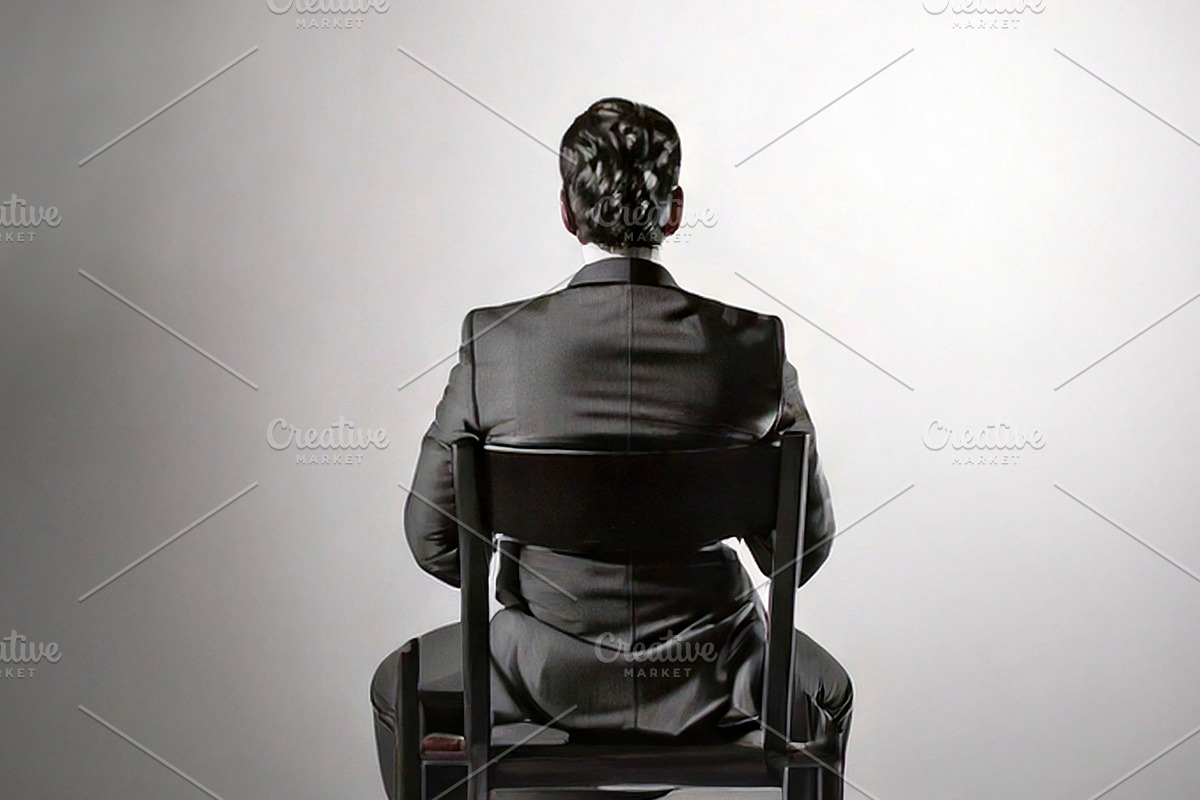 Person sitting alone on a chair with in an empty room at backgro, a Health & Medical Photo by DanFLCreativo (Photo 1 of 2)