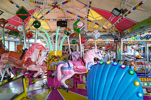 Bright carousel with colorful lights and horses, an Arts & Entertainment Photo by DanFLCreativo