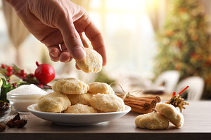 Tasting anise and cinnamon cookies in warm Christmas dining room, a Food & Drink Photo by Davizro's Market