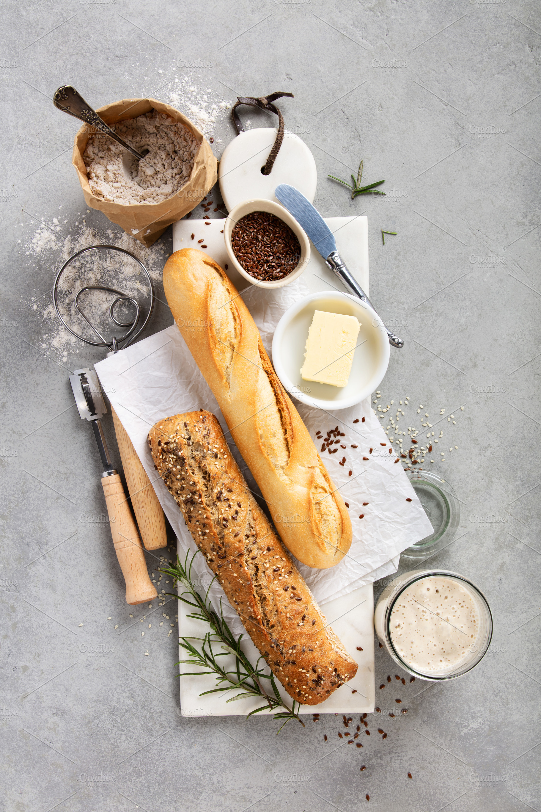 Baking Ingredients and Fresh Baguettes on Light Stone Surface, a Food & Drink Photo by Natalia Klenova's Shop