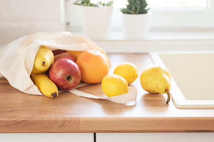 Textile tote bag filled with fruits stock photo containing textile and filled
