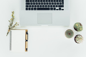 White desktop featuring top, desktop, and laptop