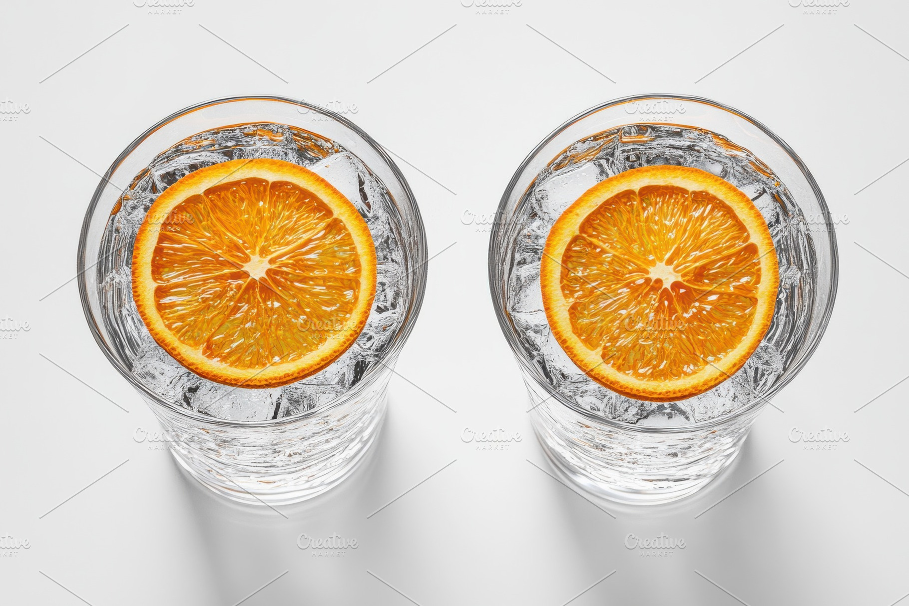 Two glasses of refreshing iced water, a Beauty & Fashion Photo by Pixeness Studio