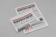 Realistic Overlap Newspaper Mockup, an Advertising Mockup by DesignRushMarket (Thumbnail 1 of 2)