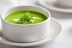 Creamy green pea soup garnished with, a Food & Drink Photo by MistyDay
