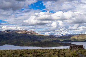 Storm clouds over Lake Lagunillas in the Peruvian highlands, a Nature Photo by GoodGoods