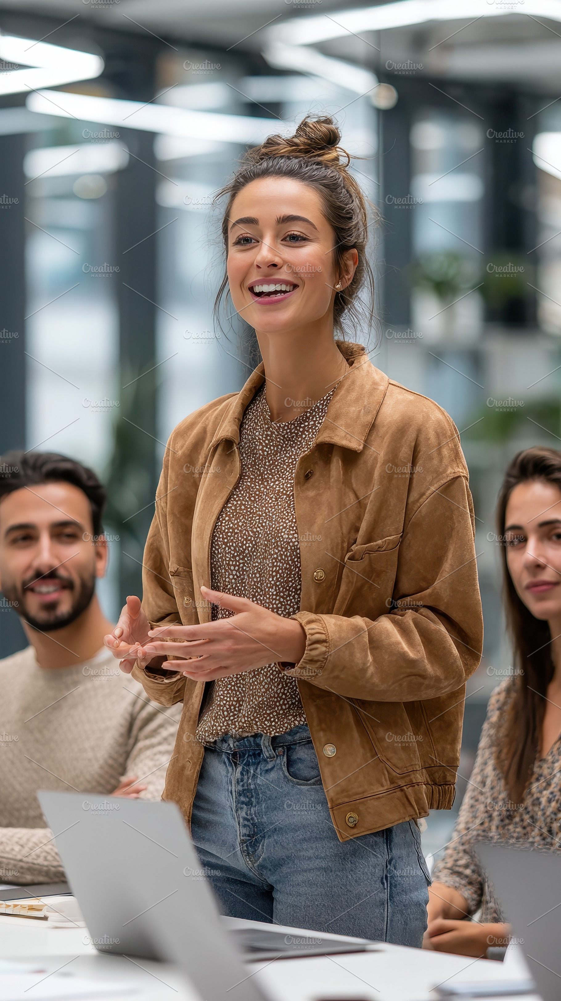 Young woman giving presentation smil, a Photo by Pixeness Studio