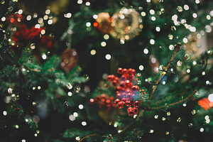 Decorated christmas tree closeup featuring abstract, background, and ball
