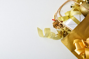 Christmas shopping detail with a golden sack full of gifts, a Holiday Photo by Davizro's Market