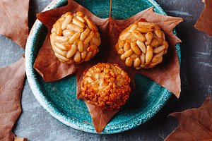 rustic green plate with Catalan panellets, a Photo by Nito