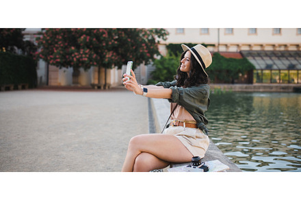 Young beautiful female traveler, a Person Photo by HalfPoint