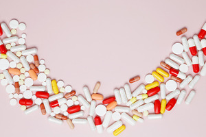 Concept of healthcare and medicine. Various medication tablets and capsules, a Photo by matucha