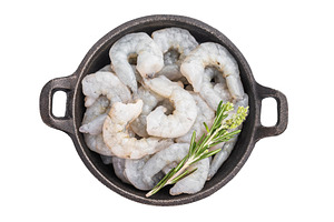 Uncooked prawns shrimps in a skillet ready for a healthy meal. T, a Food & Drink Photo by composter-box@mail.ru