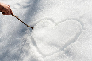 Love Heart In Snow, a Person Photo by THP Creative