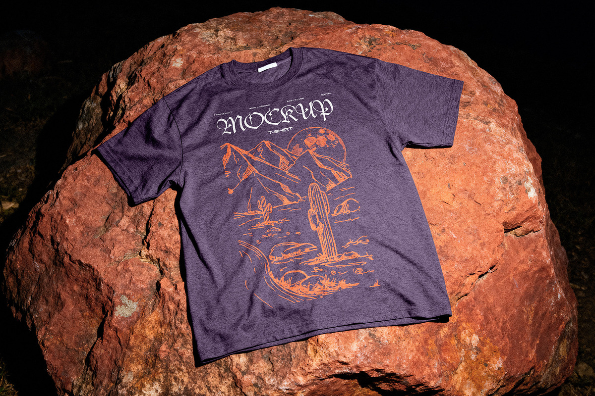 Outdoor T-Shirt Mockup on Stone, a Shirt Mockup by Design Squad (Photo 1 of 4)