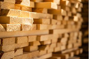 Close up stacks with wooden planks, an Industrial Photo by volodymyrshtun13795