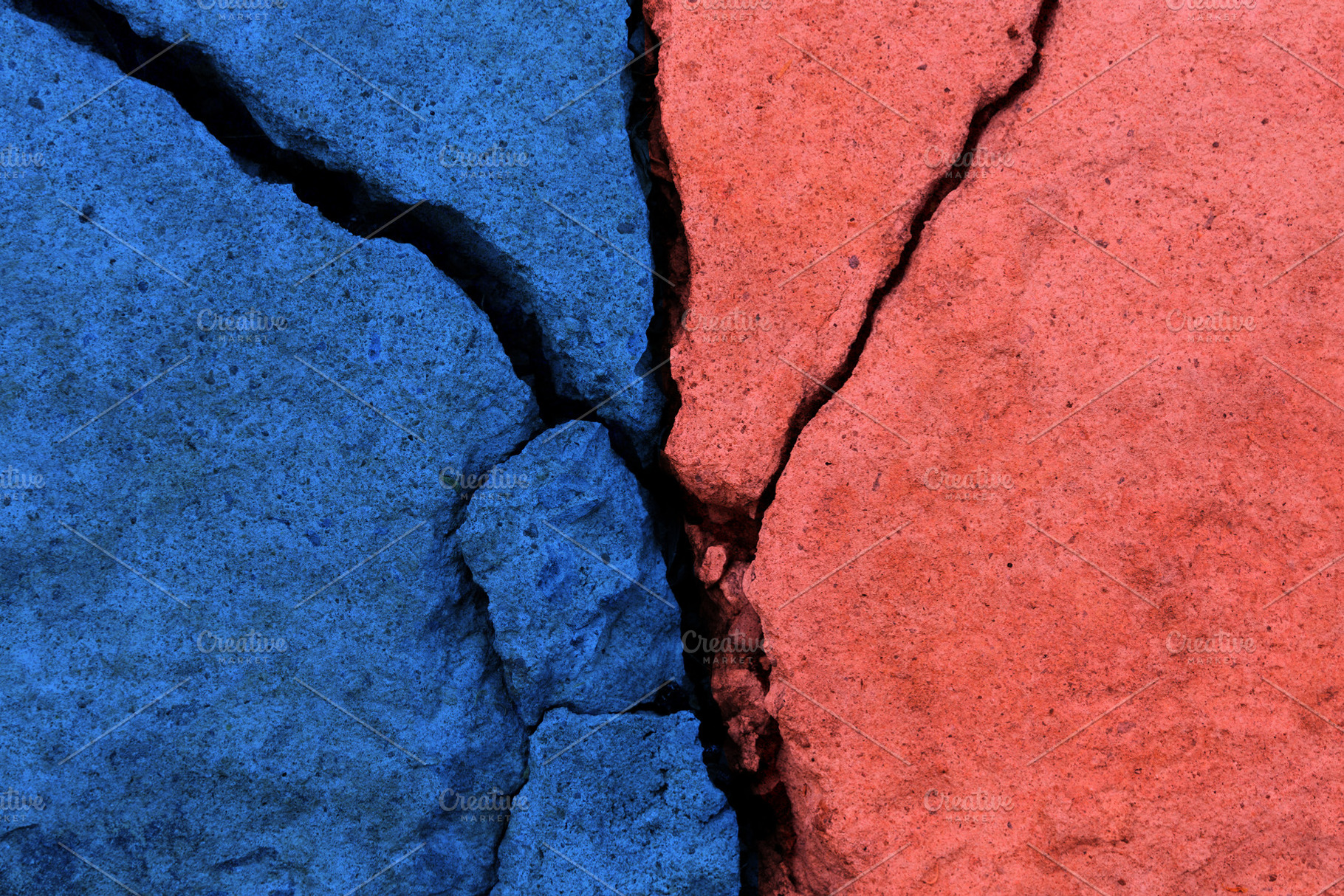 Cracked concrete surface in two colors, Conflict and divisio, a Photo by salmon.black
