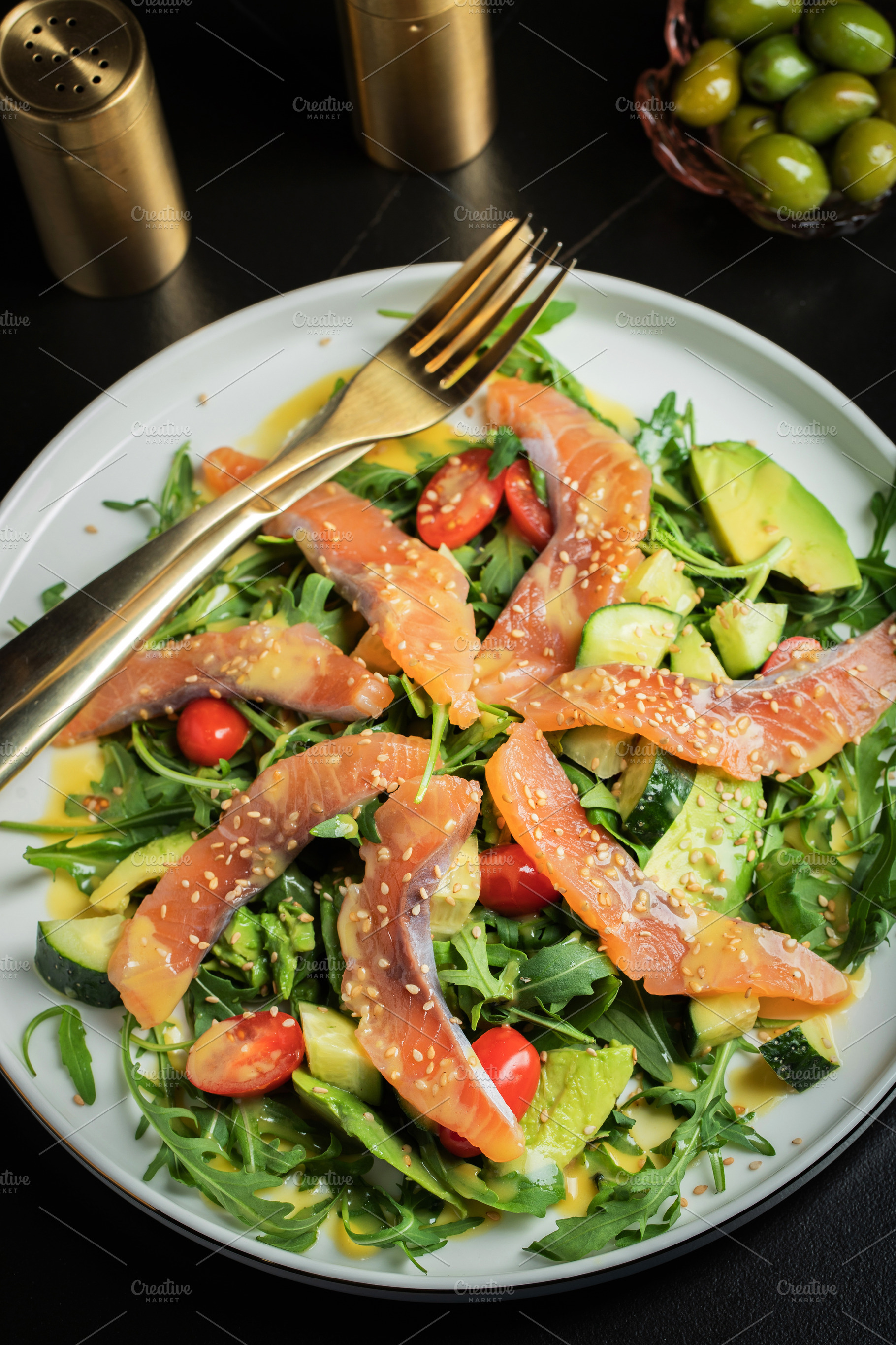 Salad with salted salmon and arugula, a Food & Drink Photo by Budarinphoto