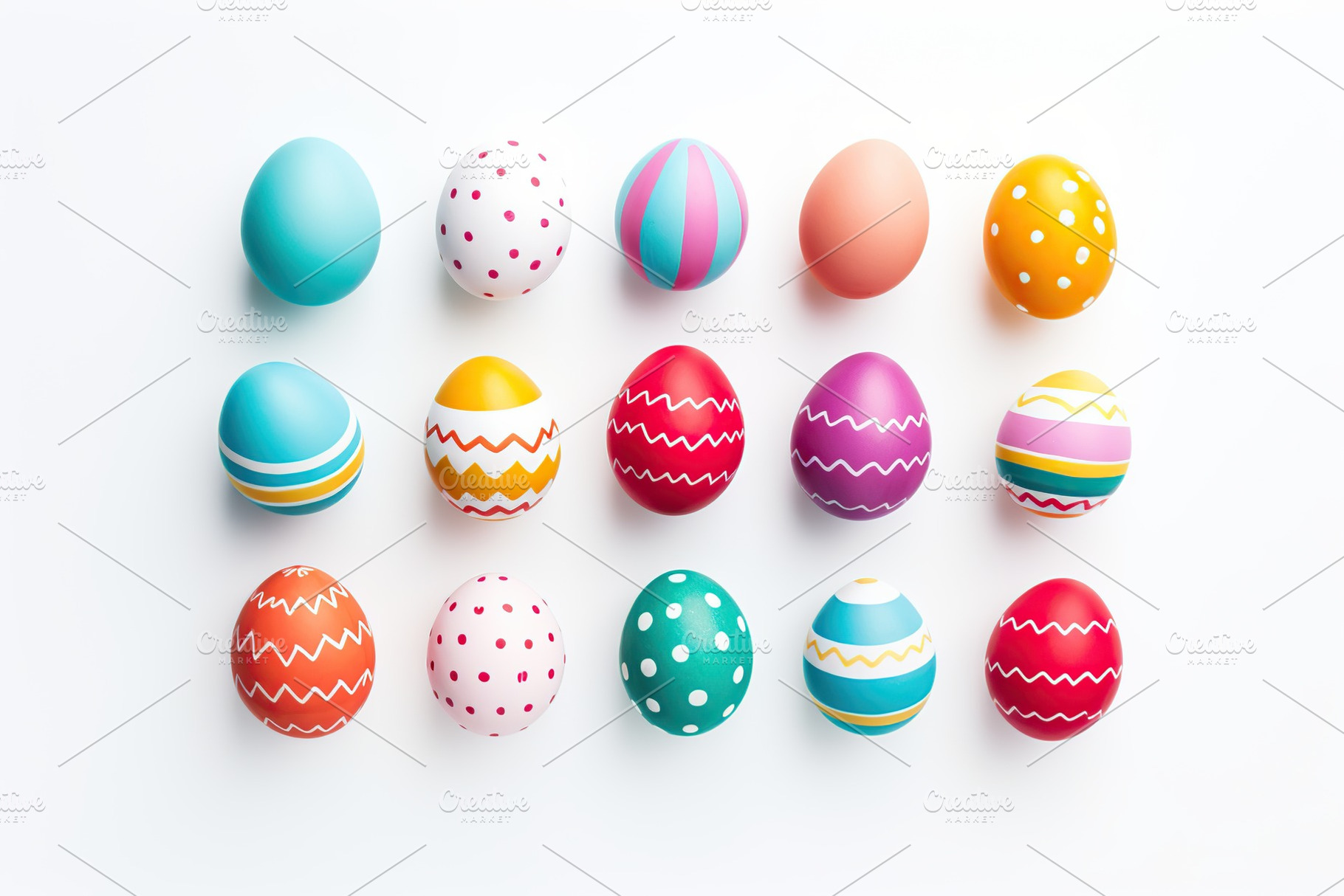Colorful easter eggs on white background, a Holiday Photo by AlyaAnd