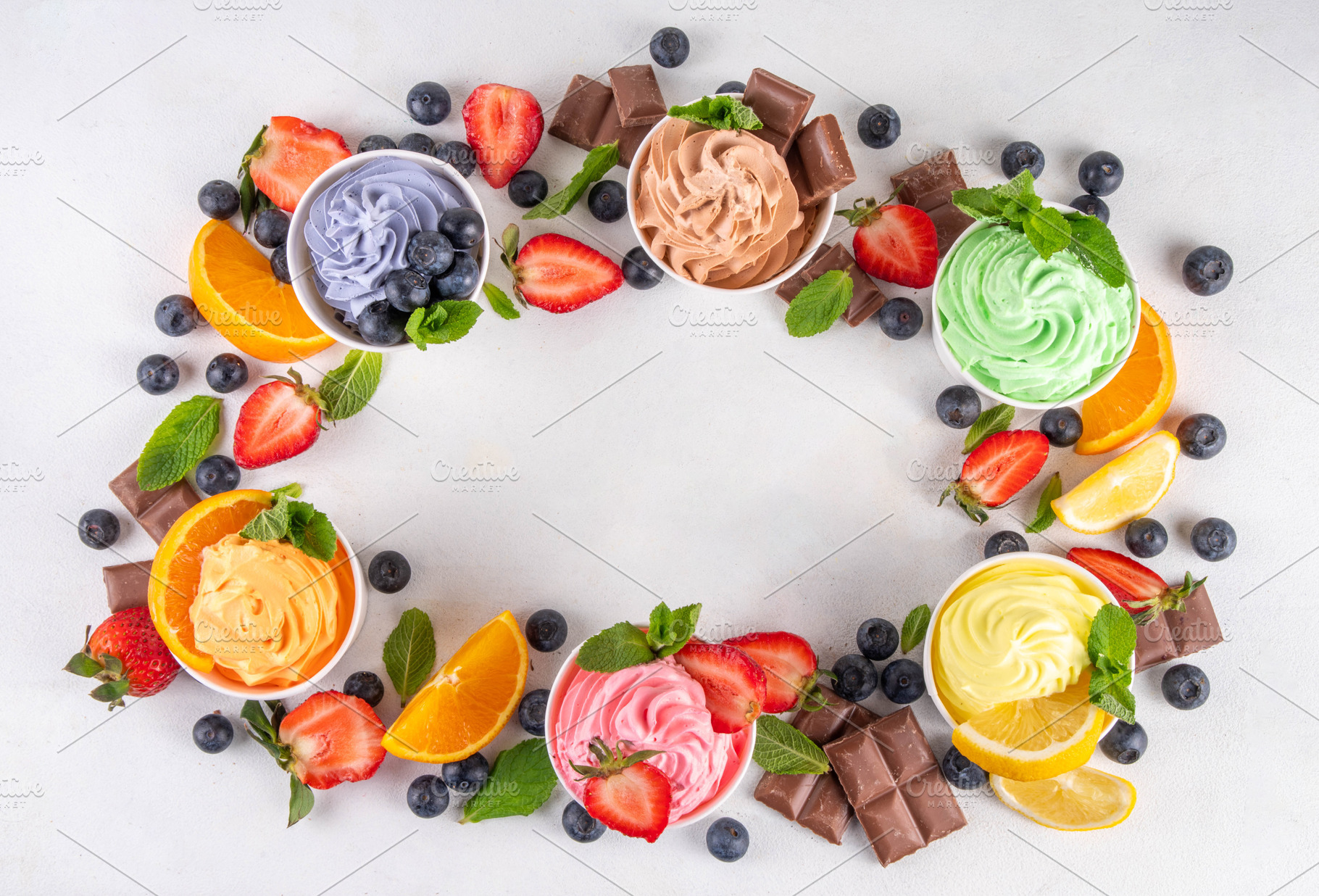 Frozen yogurt assortment. Soft creamy ice cream cups, a Food & Drink Photo by Rimma