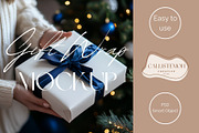 Gift Wrap Mockup w. Hands WR004-01, a Books & Magazine Mockup by Callistemon Creative (Thumbnail 1 of 8)