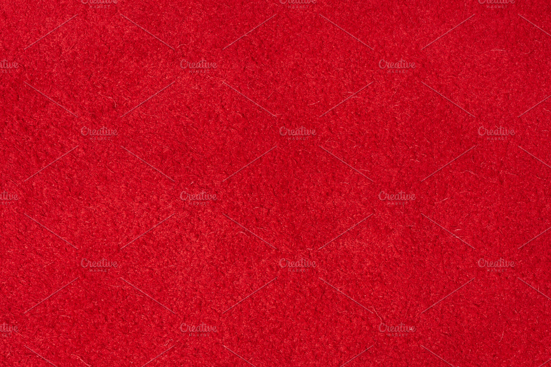 Close up of rich red suede showing the soft, shaggy surface text, an Abstract Photo by ndanko