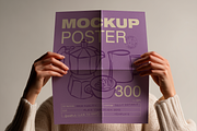 Woman Holding Poster Mockup, an Advertising Mockup by The Rose Project (Thumbnail 2 of 3)