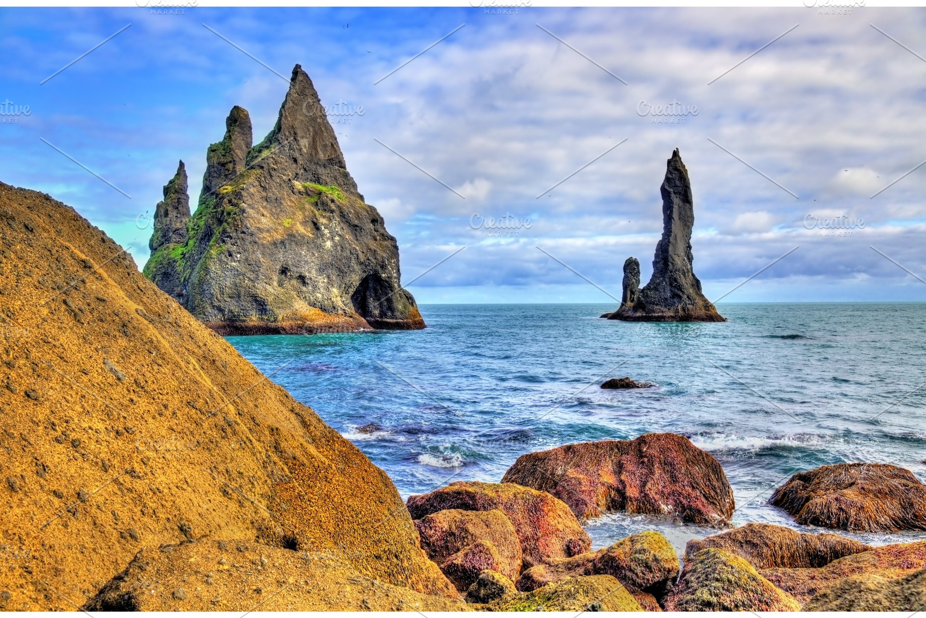 Reynisdrangar basalt sea stacks in iceland featuring reynisdrangar, iceland, a Nature Photo by Leonid Andronov