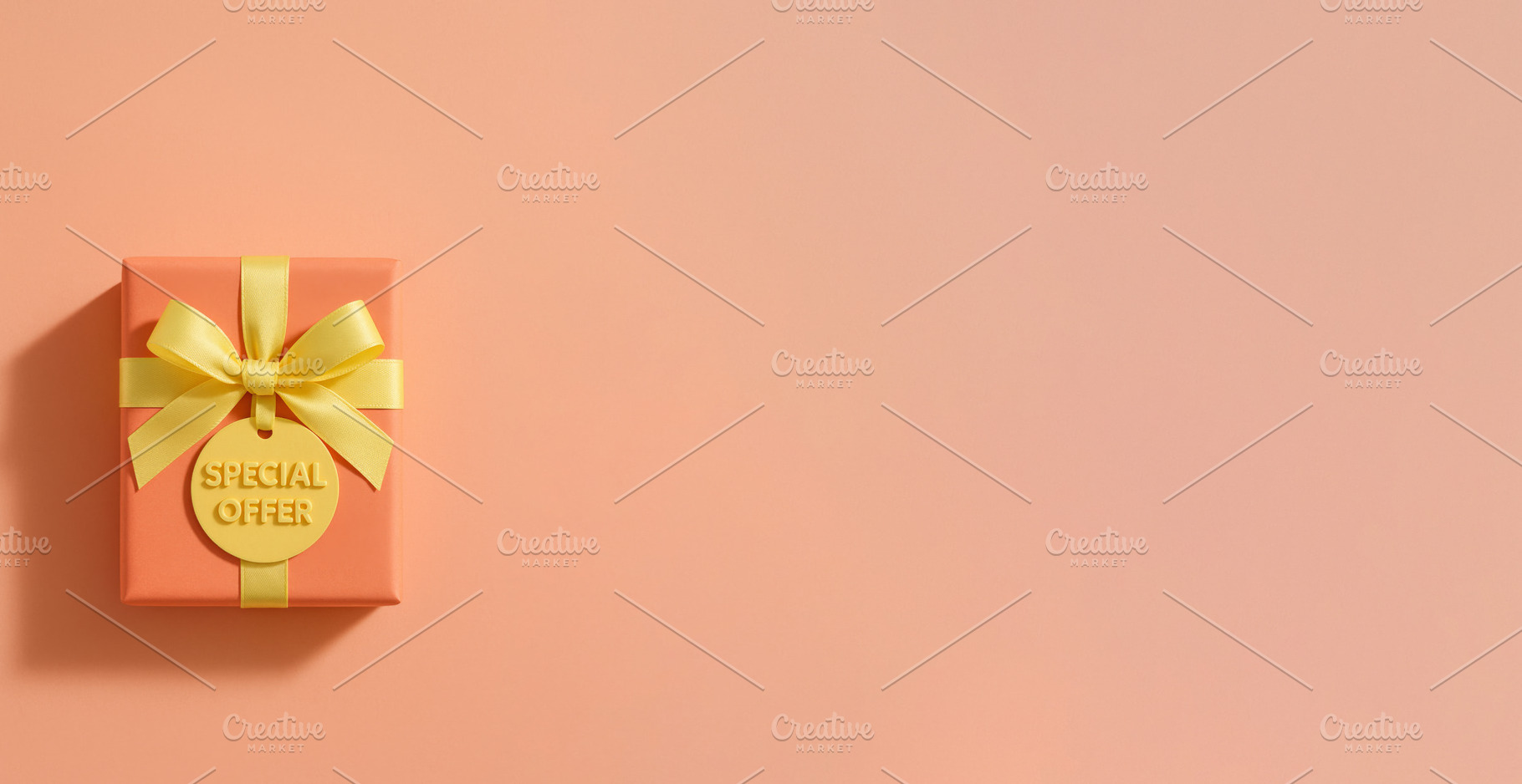 Gift box with yellow ribbon and special offer tag on pastel back, a Photo by Dvoevnore photos