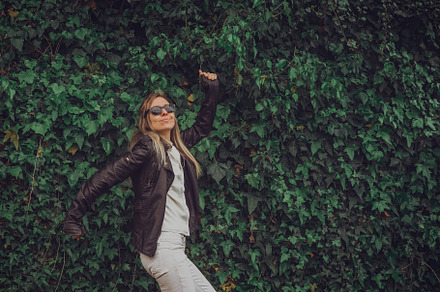 happy woman in ivy environment, a Person Photo by DalaiFood