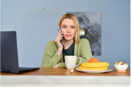 Young woman with a smartphone at, a Person Photo by undrey
