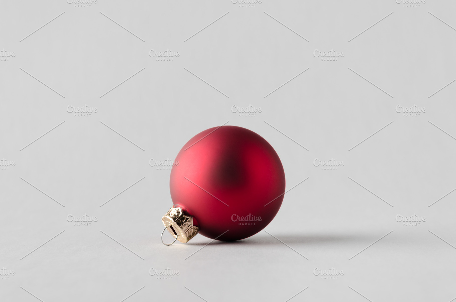 Red matte Christmas ball, a Holiday Photo by Shablon