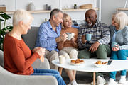 Positive multiracial senior people spending time together at retirement house, a Photo by Prostock-Studio (Thumbnail 1 of 2)