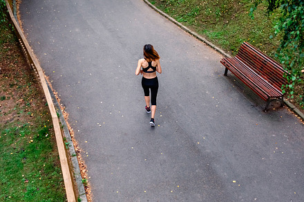 Aerial view of female runner backwards, a Sports & Recreation Photo by davidpereiras