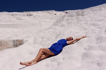 Woman in blue on white, a Holiday Photo by Irina